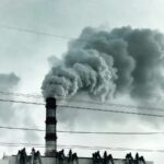 A picture of a smoke stack spewing explosive gas into the air